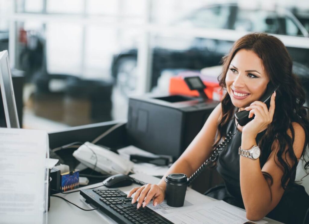 A rep displaying how an automotive business development center can help dealerships grow